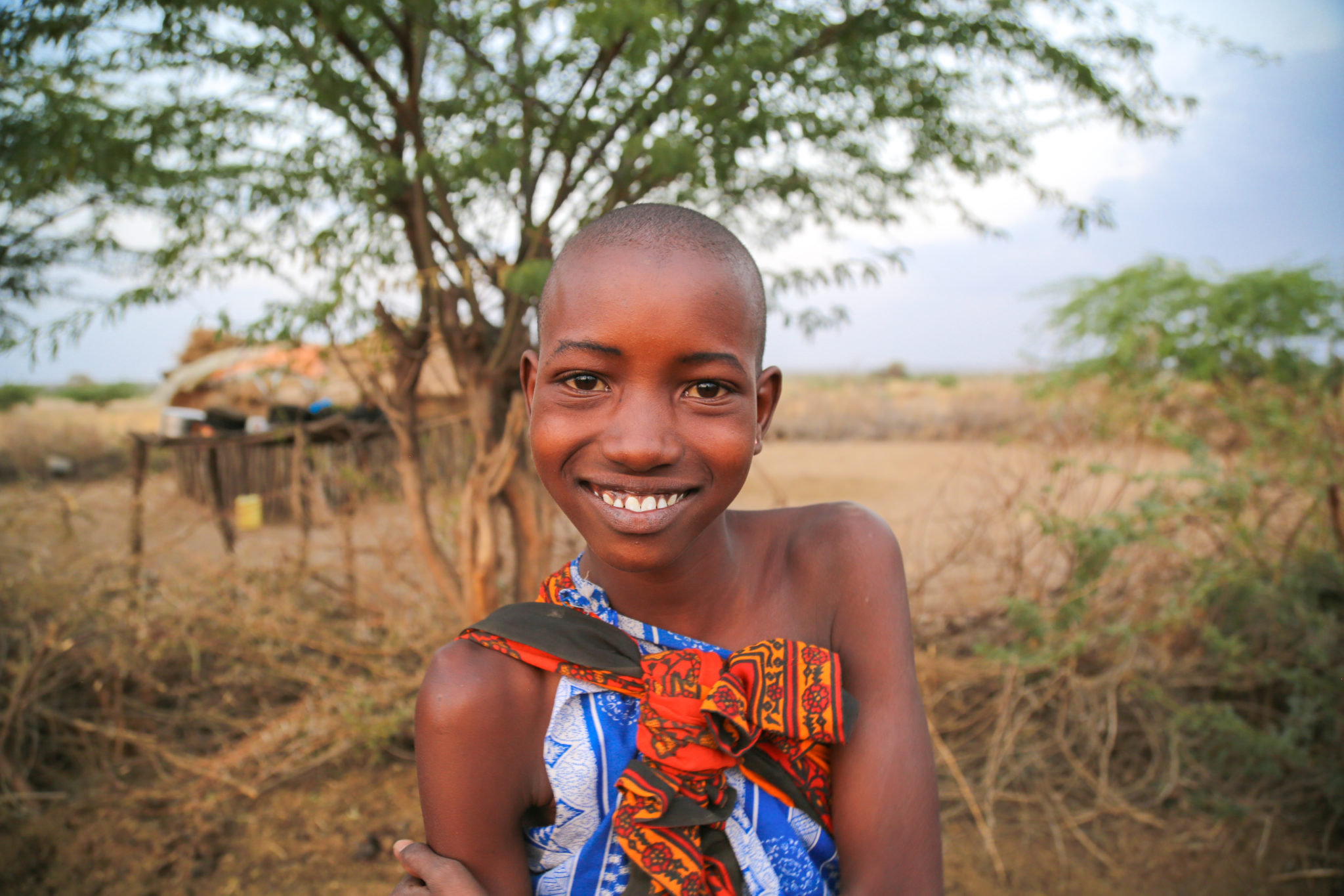 Young Maasai Girl Smiling - Mar Gone Wild
